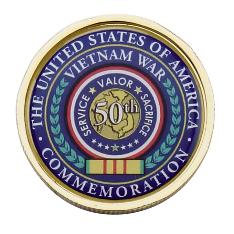 Round gold-edge Vietnam War 50th anniversary commemoration challenge coin with red, white, and blue artwork