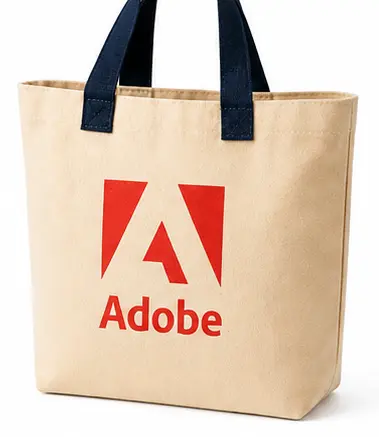 Natural cotton canvas tote bag with navy handles and a custom logo